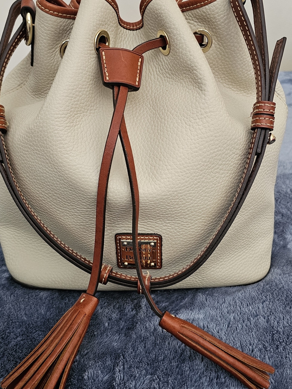Dooney & Bourke Cream and Brown Leather Drawstring Bucket Bag